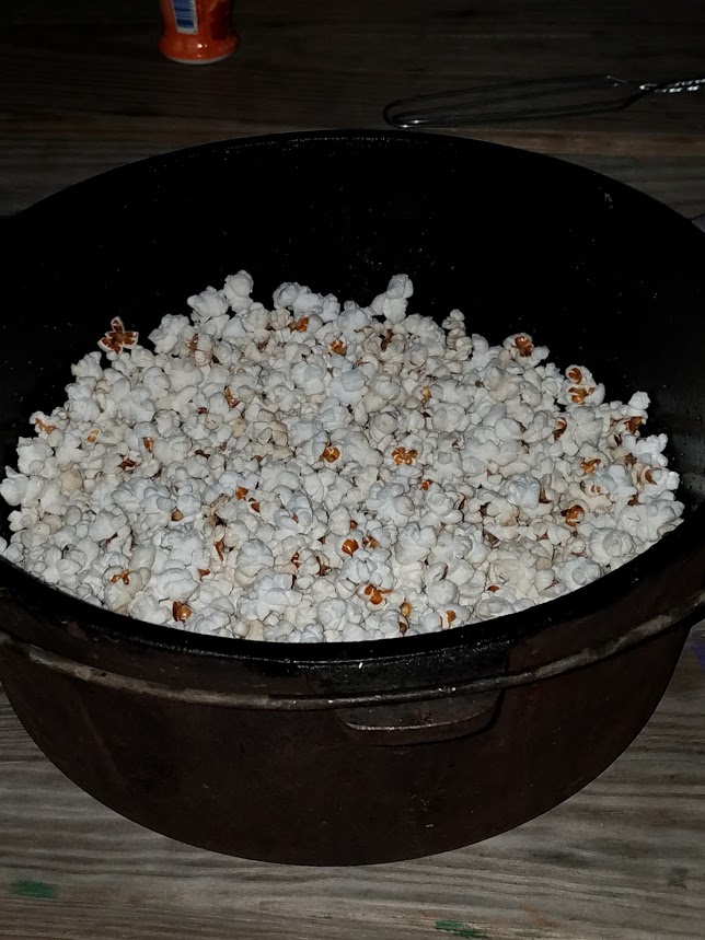 Easy Camp Popcorn in a Dutch Oven Pinch Of Smoke
